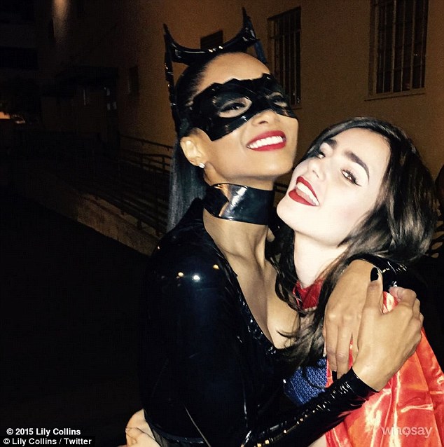 Ciara as Catwoman and Lily Collins as Supergirl